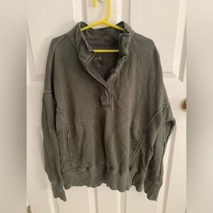 Size extra small, camo green quarter button sweatshirt form aerie.